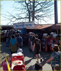 view at indoor dealer booths at the flea market