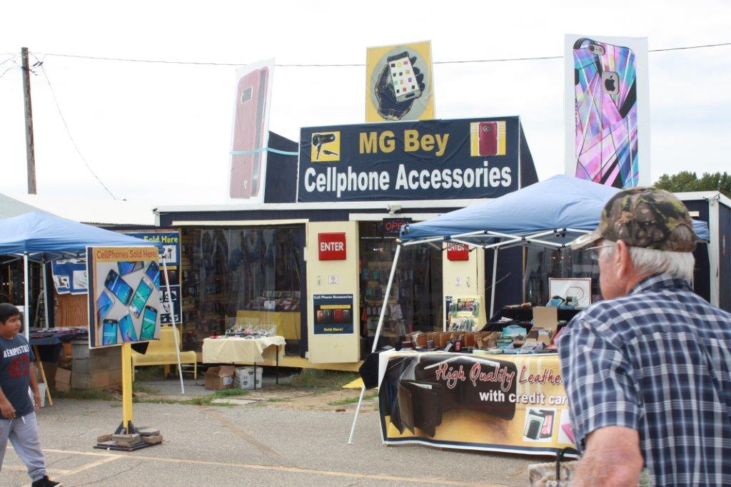 view at indoor dealer booths at the flea market