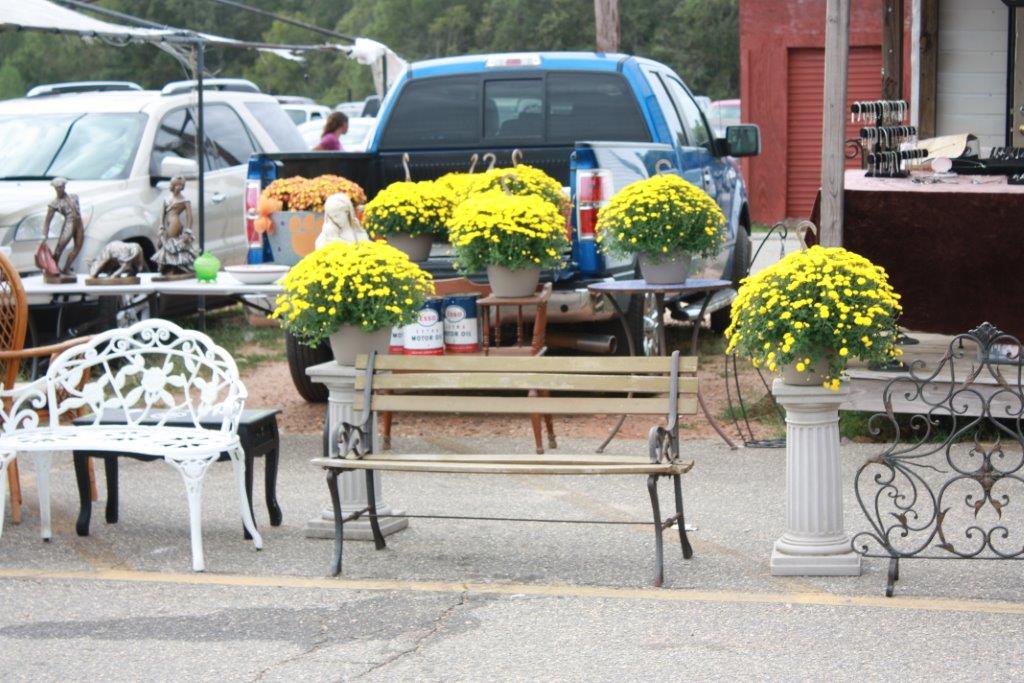 view at indoor dealer booths at the flea market