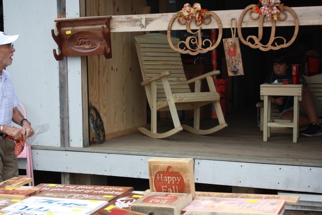 view at indoor dealer booths at the flea market